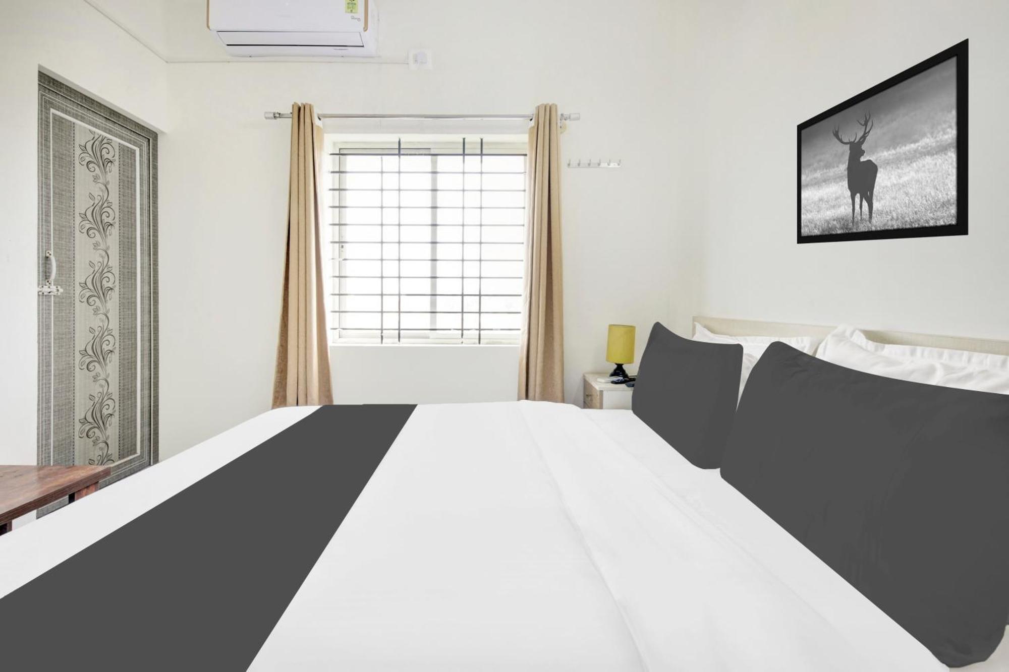 Hotel O Sri Manjunatha Deluxe Suites Bangalore Extérieur photo